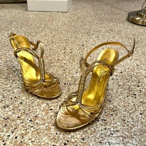 Daniel and Barbara gold sandal. 3-inch heels. Metallic shimmer